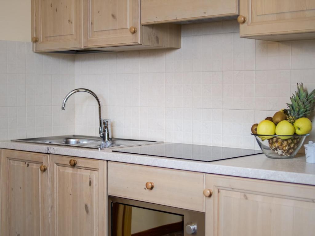 Kuchyň nebo kuchyňský kout v ubytování Residence Pedranzini