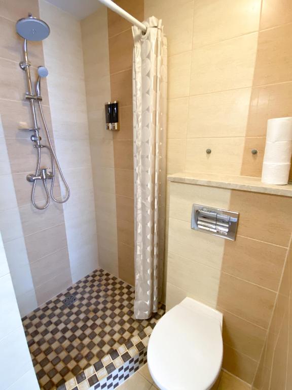 Kúpeľňa v ubytovaní Pokoje Gościnne Przy Molo