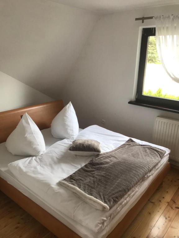 Posteľ alebo postele v izbe v ubytovaní Domek pod Czantorią