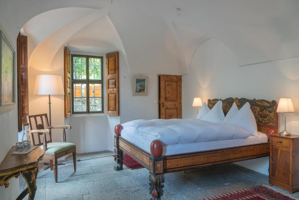 Postel nebo postele na pokoji v ubytování Hotel Palazzo Salis