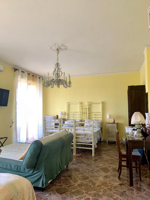Postel nebo postele na pokoji v ubytování Larala'