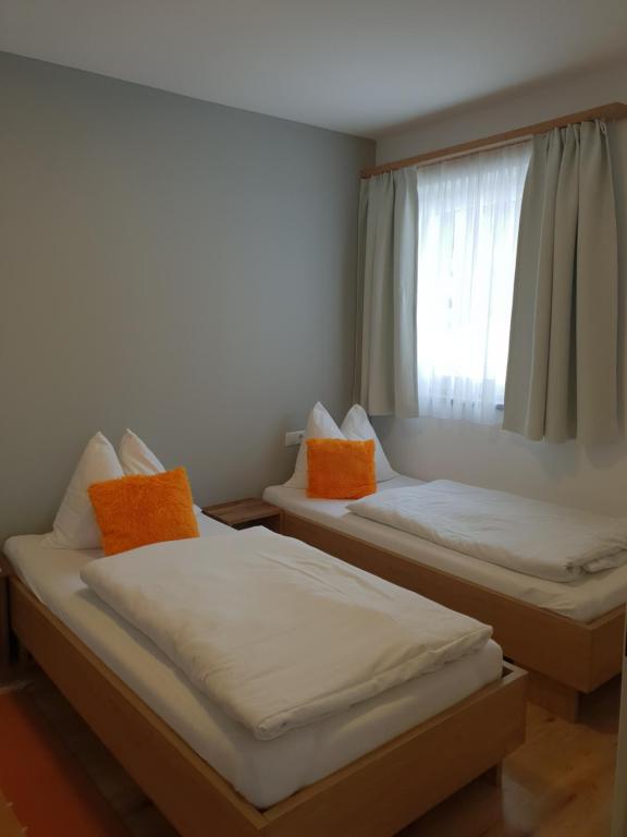 Postel nebo postele na pokoji v ubytování Ferienwohnung Unterlechner