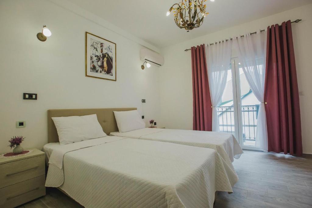 Säng eller sängar i ett rum på Hotel Dapčević