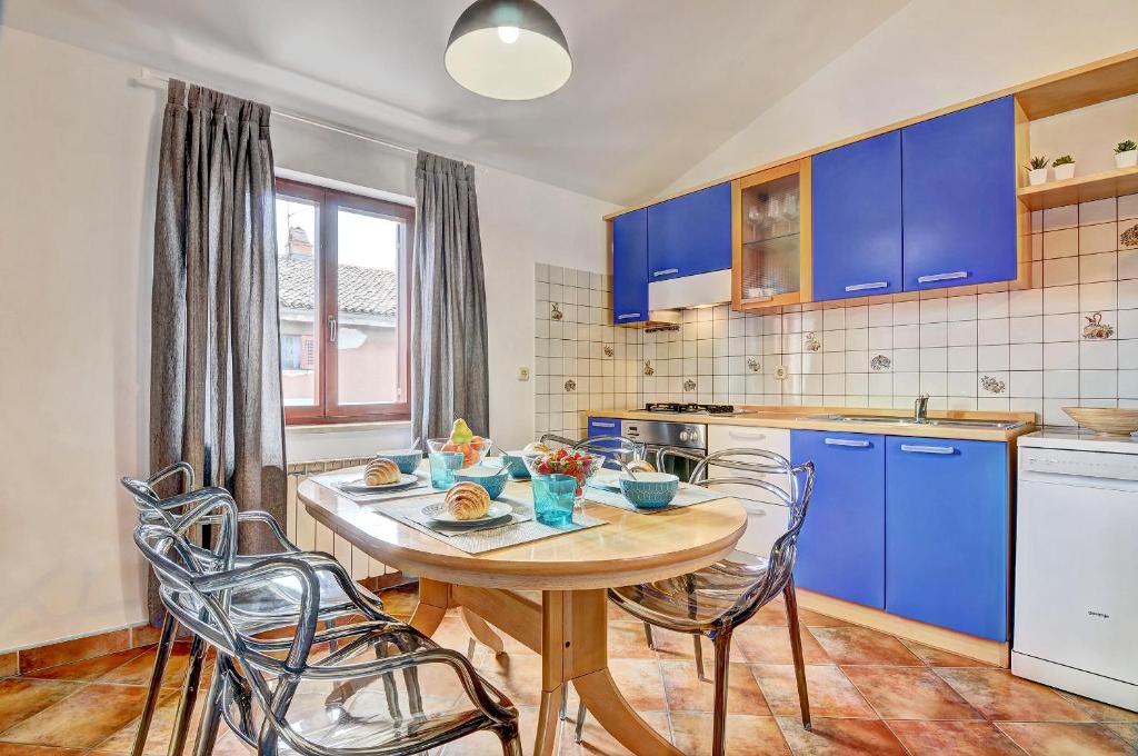 Kuchyň nebo kuchyňský kout v ubytování Apartment Adriana
