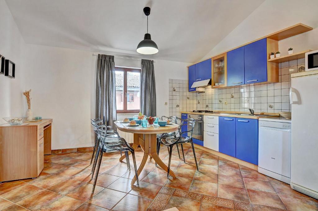 Kuchyň nebo kuchyňský kout v ubytování Apartment Adriana