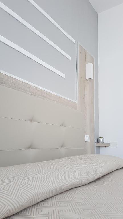 Voodi või voodid majutusasutuse Albergo Paris toas
