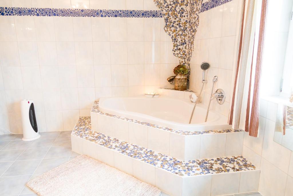 Postel nebo postele na pokoji v ubytování Strauss Appartements