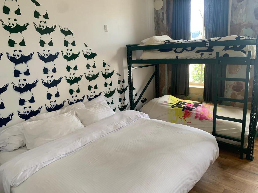 Postel nebo postele na pokoji v ubytování Hostel Fish