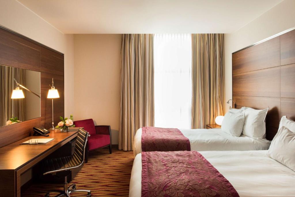 Postel nebo postele na pokoji v ubytování Best Western Premier BHR Treviso Hotel