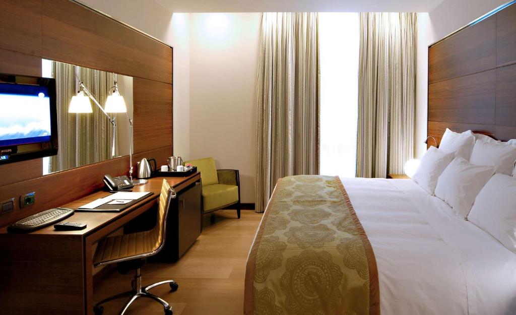 Postel nebo postele na pokoji v ubytování Best Western Premier BHR Treviso Hotel