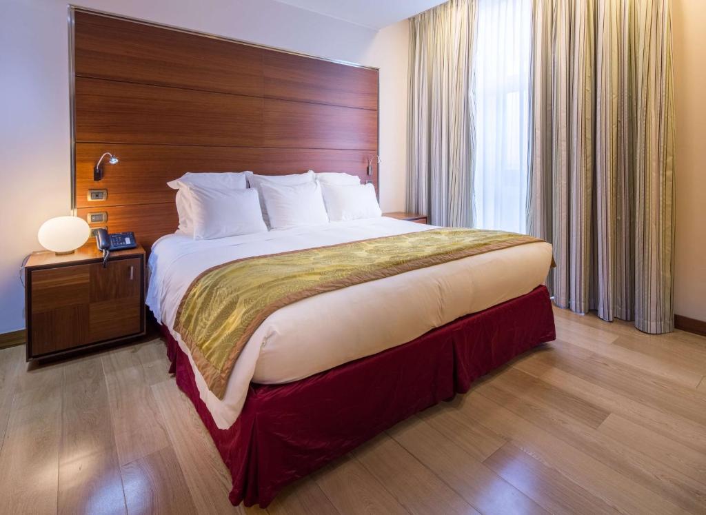 Postel nebo postele na pokoji v ubytování Best Western Premier BHR Treviso Hotel