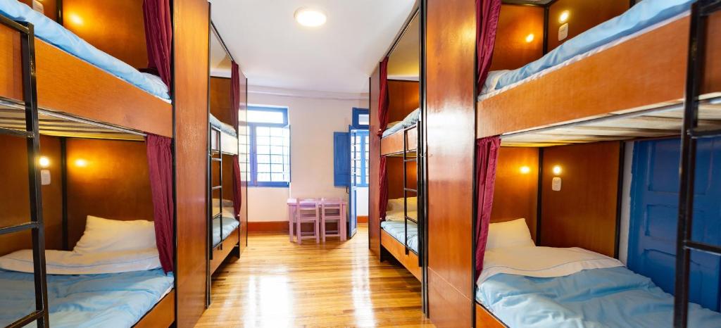 Postel nebo postele na pokoji v ubytování Granada Hostel