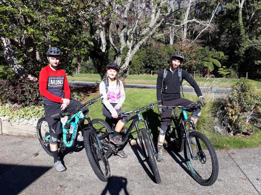a group of three people sitting on their bikes at Maple House B&B in Rotorua