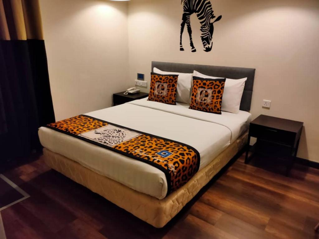 Postel nebo postele na pokoji v ubytování 9 Square Hotel - Subang