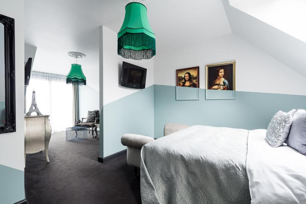 Posteľ alebo postele v izbe v ubytovaní City Solei Boutique Hotel