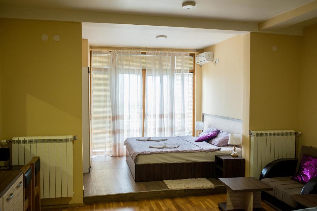 Postel nebo postele na pokoji v ubytování Hotel Bella Nella