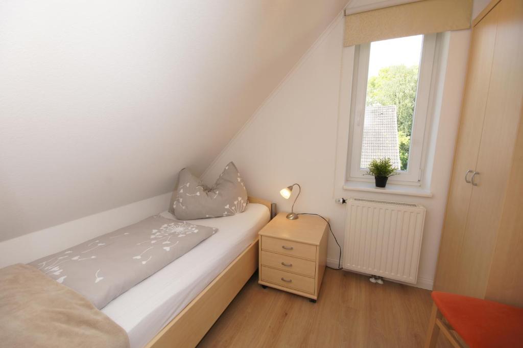 Postel nebo postele na pokoji v ubytování Ferienhaus II Wiesenblick