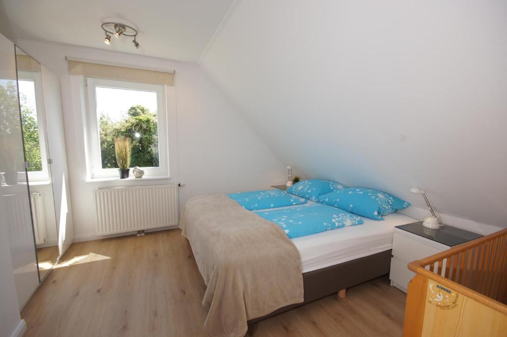 Postel nebo postele na pokoji v ubytování Ferienhaus II Wiesenblick