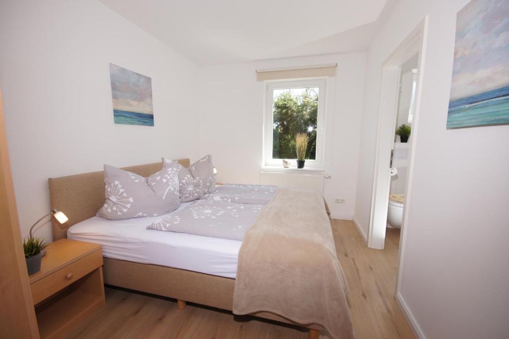 Postel nebo postele na pokoji v ubytování Ferienhaus II Wiesenblick