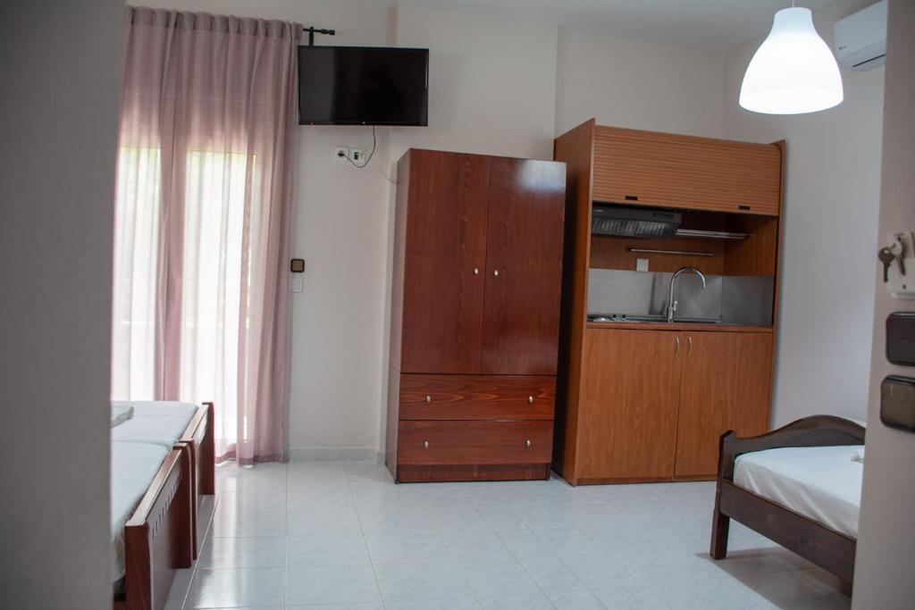 Kuchyň nebo kuchyňský kout v ubytování Mokos Rooms