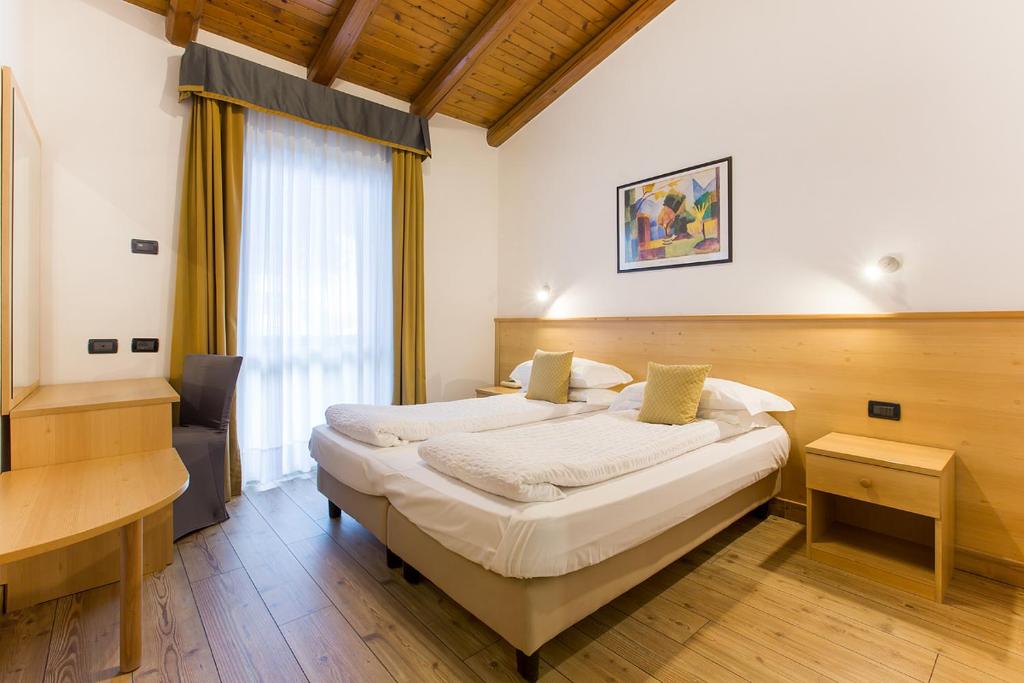 Postel nebo postele na pokoji v ubytování Hotel Derby