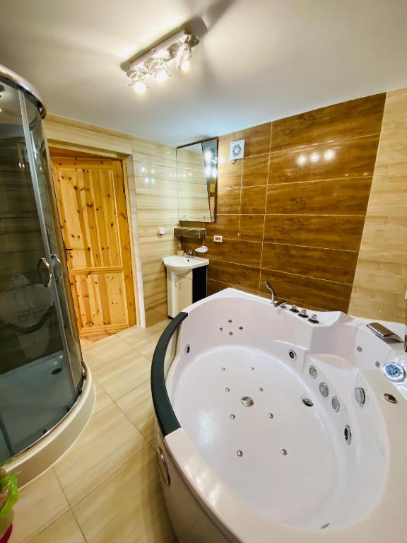 Koupelna v ubytování Komfortowy Domek AGA Centrum