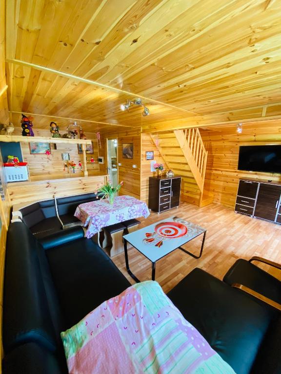 Posezení v ubytování Komfortowy Domek AGA Centrum
