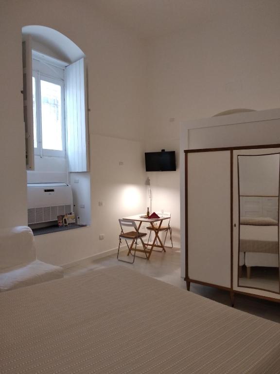 A bed or beds in a room at La Chiave di Volta