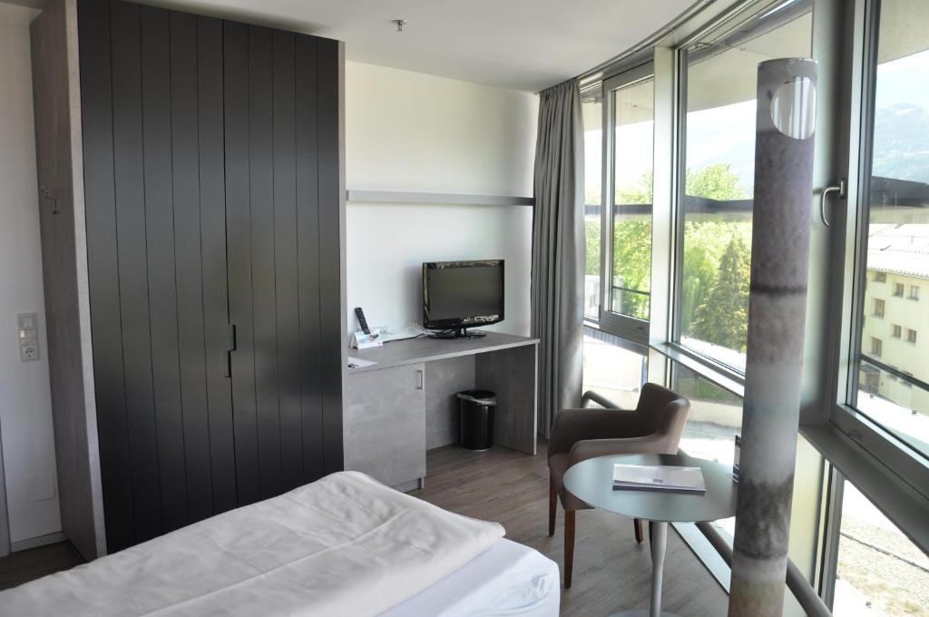 TV a/nebo společenská místnost v ubytování Parkhotel Hall in Tirol
