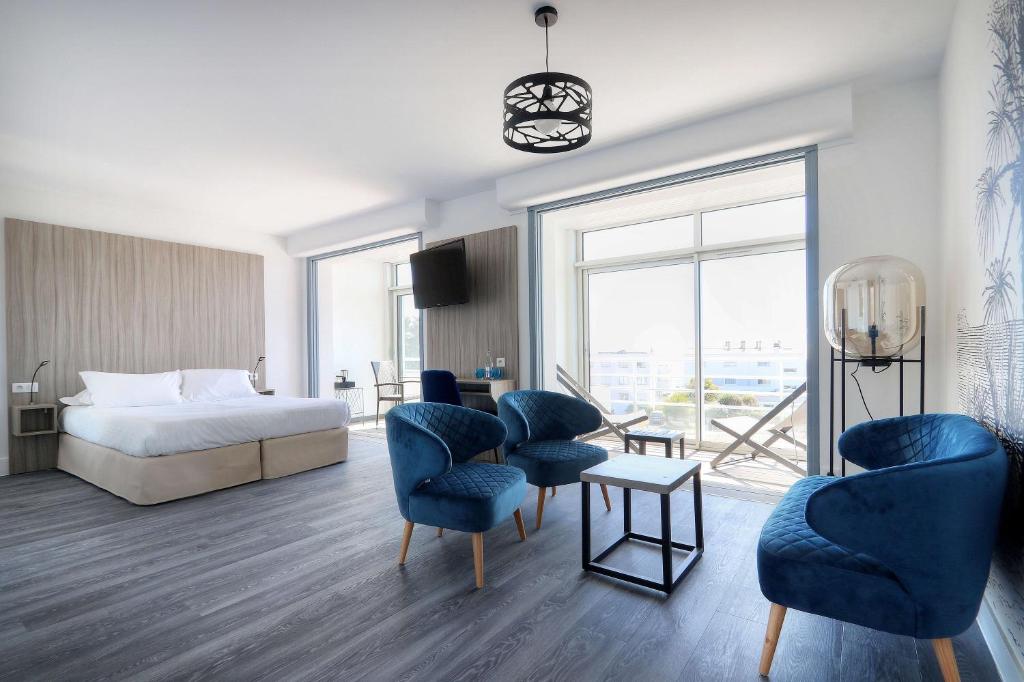 Postel nebo postele na pokoji v ubytování Best Western Hôtel Le Bellevue Quiberon
