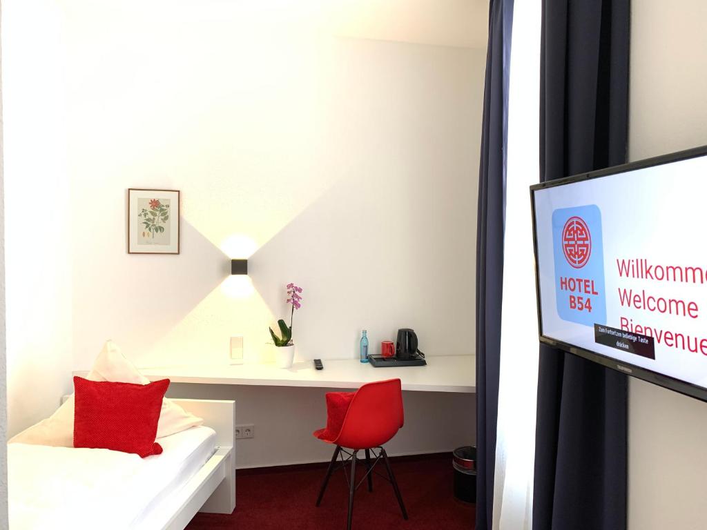 TV a/nebo společenská místnost v ubytování Hotel B54 Heidelberg City Center