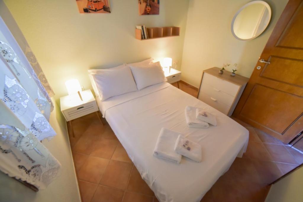 Postel nebo postele na pokoji v ubytování Villa Eva Halkidiki