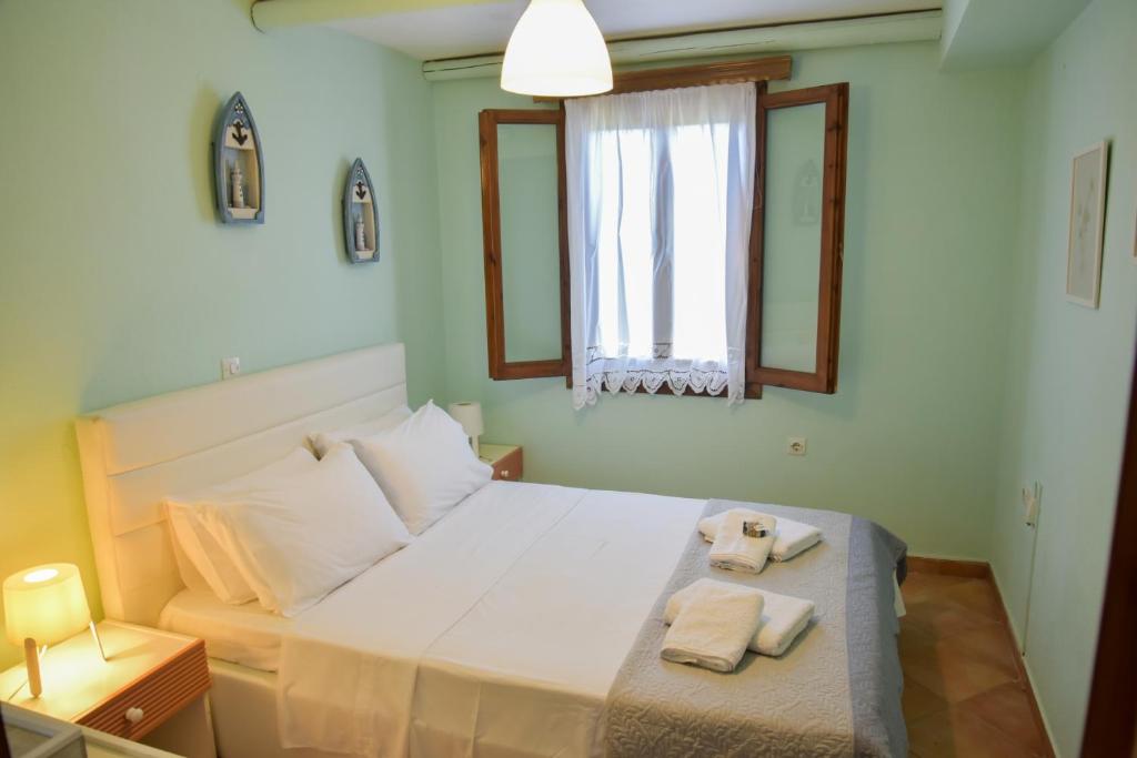 Postel nebo postele na pokoji v ubytování Villa Eva Halkidiki