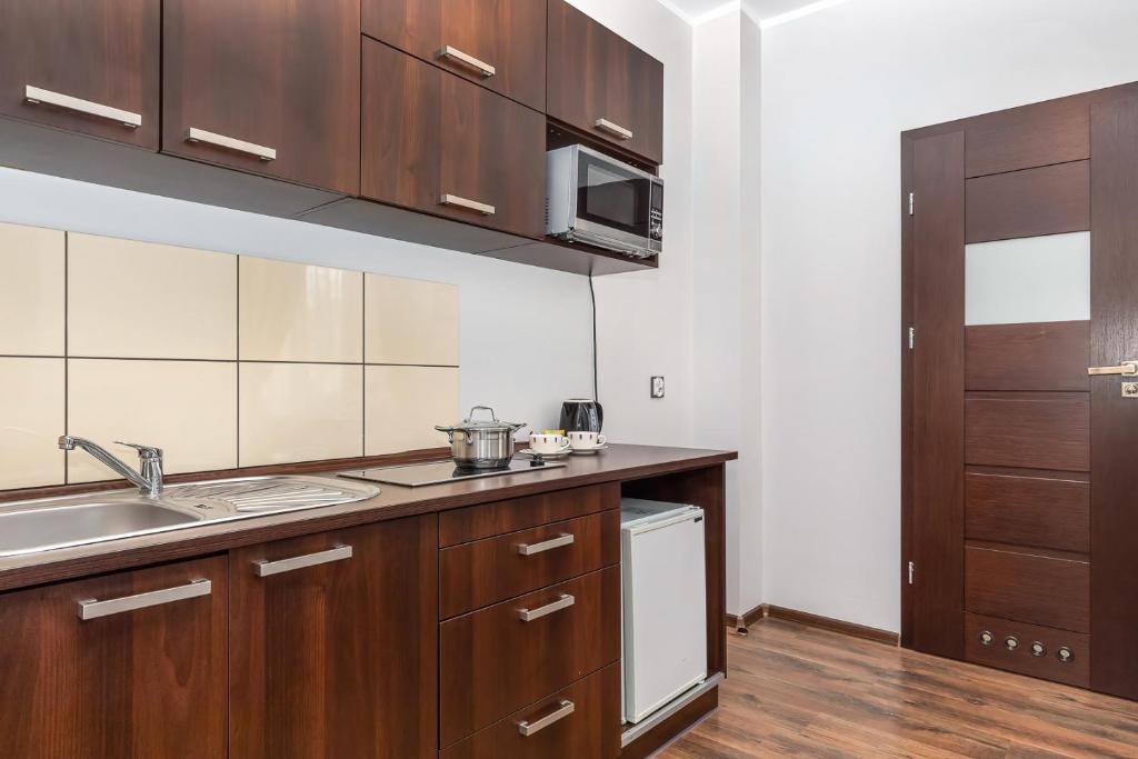 Kuchyň nebo kuchyňský kout v ubytování Villa Baltic Dream