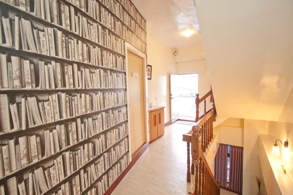 Postel nebo postele na pokoji v ubytování Dons Young Homestay