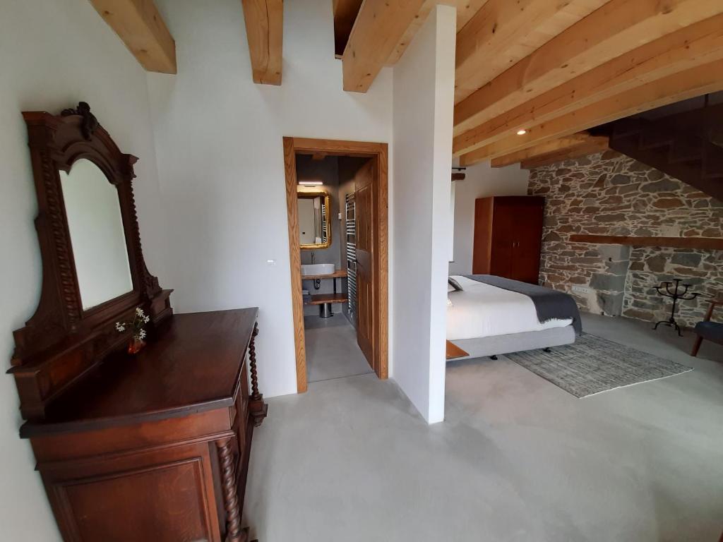 Postel nebo postele na pokoji v ubytování Dvor Vipolže