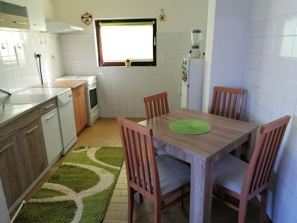 Kuchyň nebo kuchyňský kout v ubytování Apartman Santos