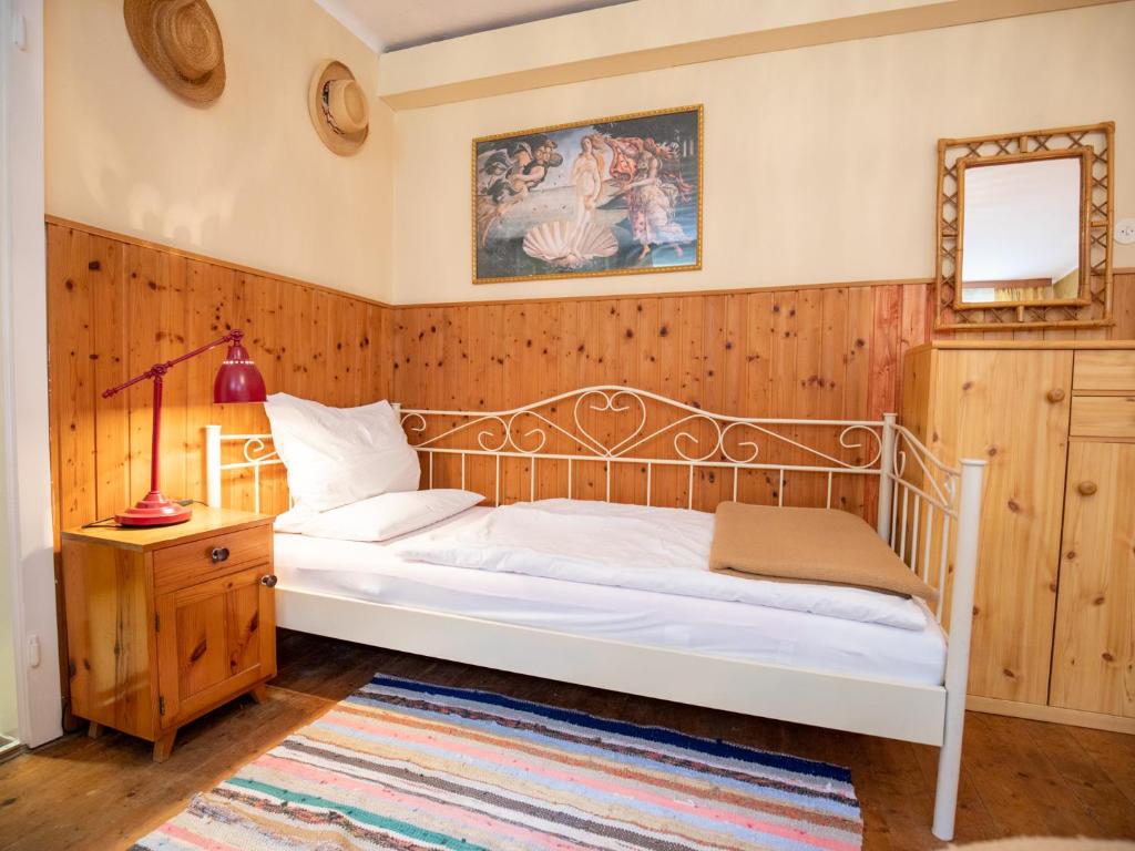 Postel nebo postele na pokoji v ubytování Gästehaus Pension Ria