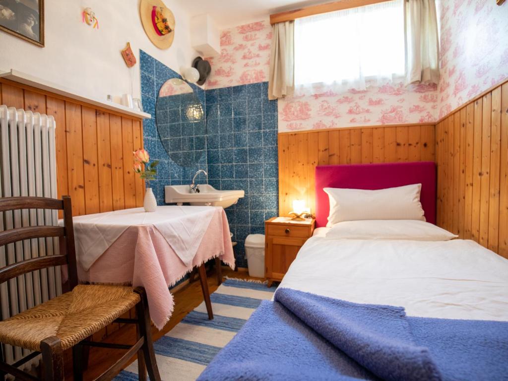 Postel nebo postele na pokoji v ubytování Gästehaus Pension Ria