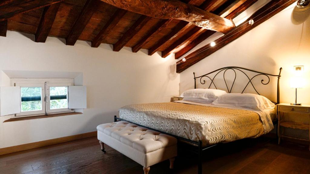 Postel nebo postele na pokoji v ubytování La Corte Dei Sogni B&B