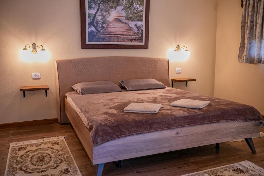 Postel nebo postele na pokoji v ubytování Ethno Lodge AB