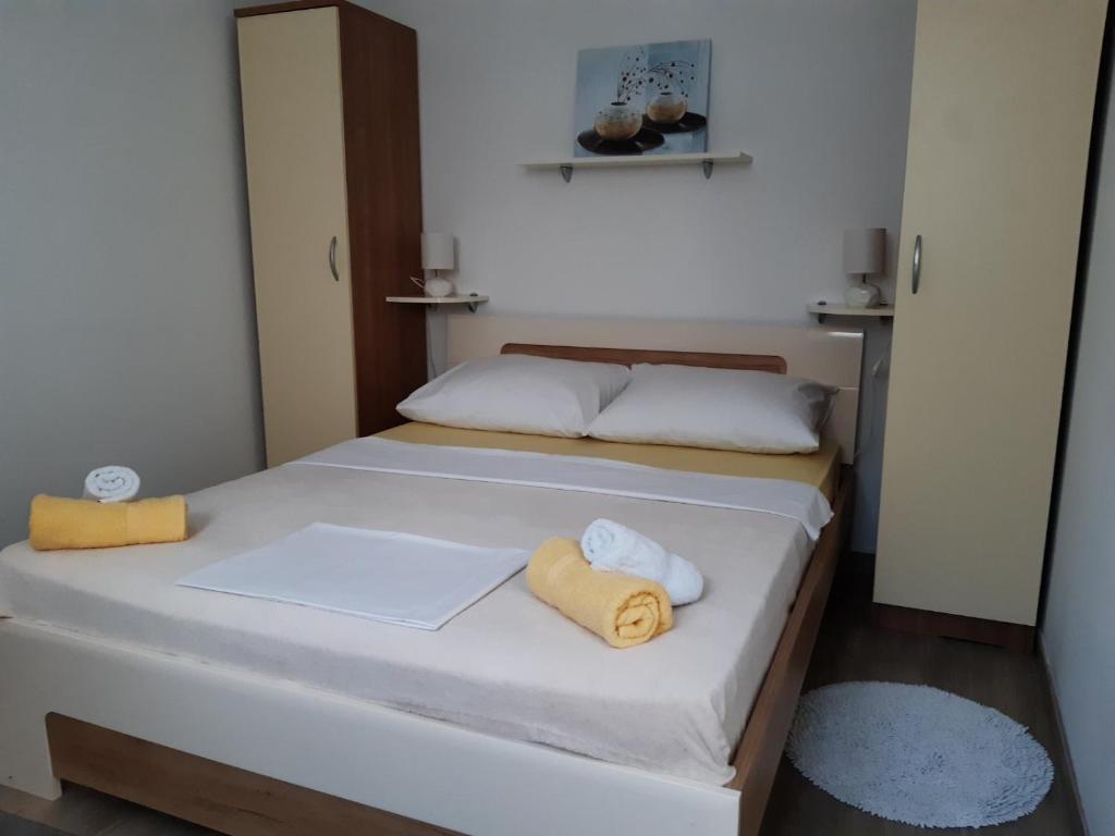 Postel nebo postele na pokoji v ubytování Guest House Sonja