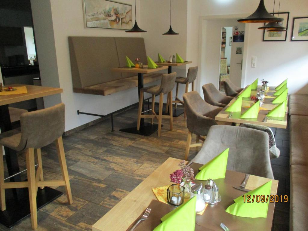 Reštaurácia alebo iné gastronomické zariadenie v ubytovaní Aparthotel Garni Schranz