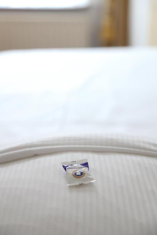 Postel nebo postele na pokoji v ubytování Villa-Hotel De Kroon Gennep