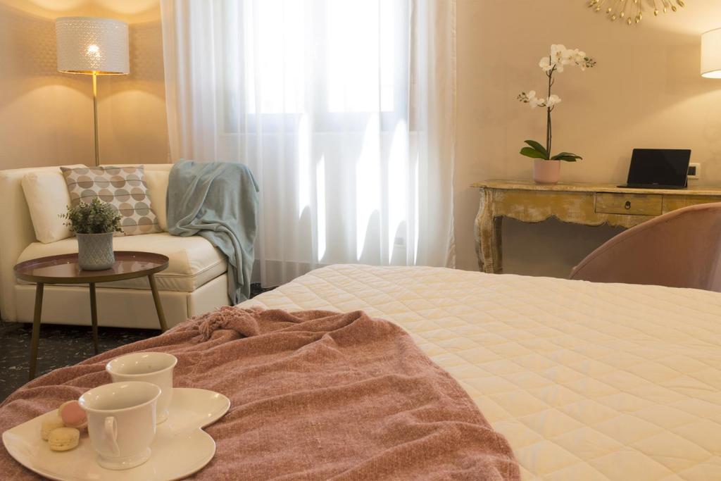 Posteľ alebo postele v izbe v ubytovaní Accanto Al Centro B&B