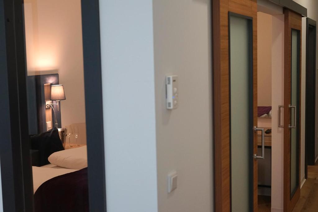 Postel nebo postele na pokoji v ubytování DIWOTEL by Trip Inn Frankfurt Airport Dreieich