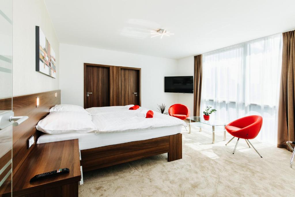 Telewizja i/lub zestaw kina domowego w obiekcie Pierre Hotel