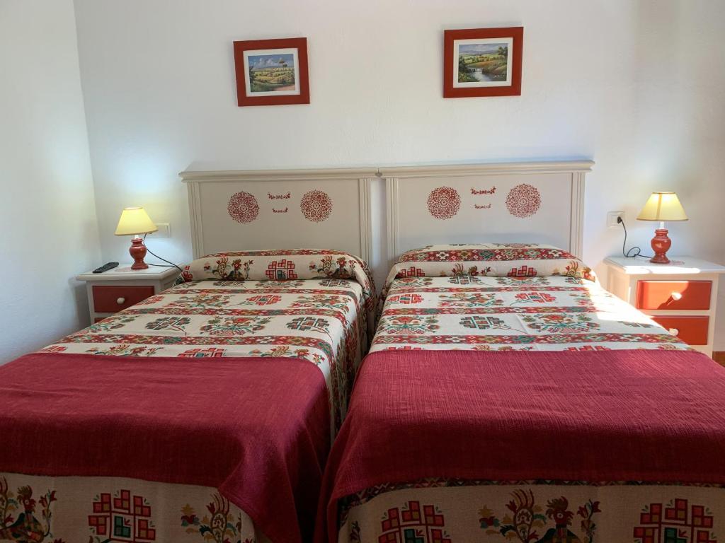 Postel nebo postele na pokoji v ubytování Hostal Atalaya en Capileira CB