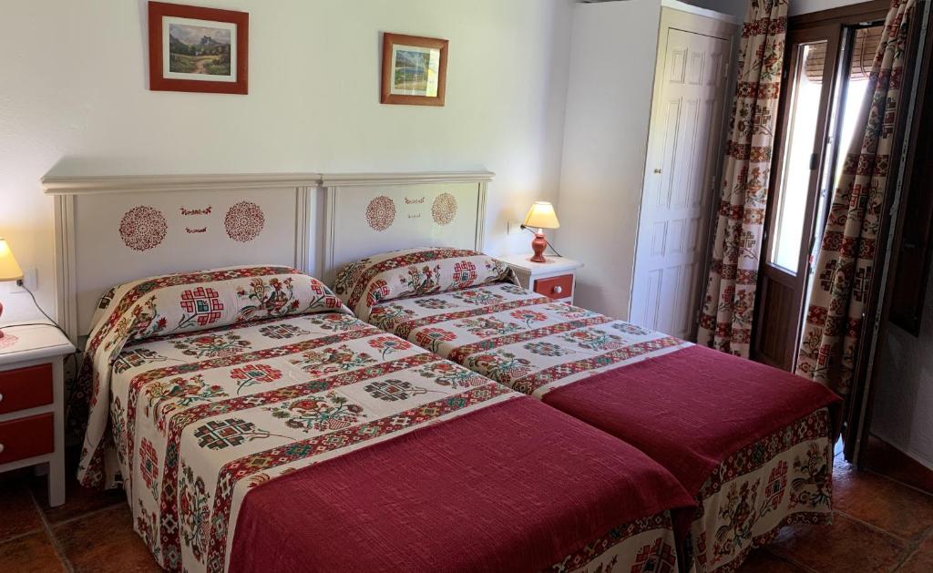 Postel nebo postele na pokoji v ubytování Hostal Atalaya en Capileira CB