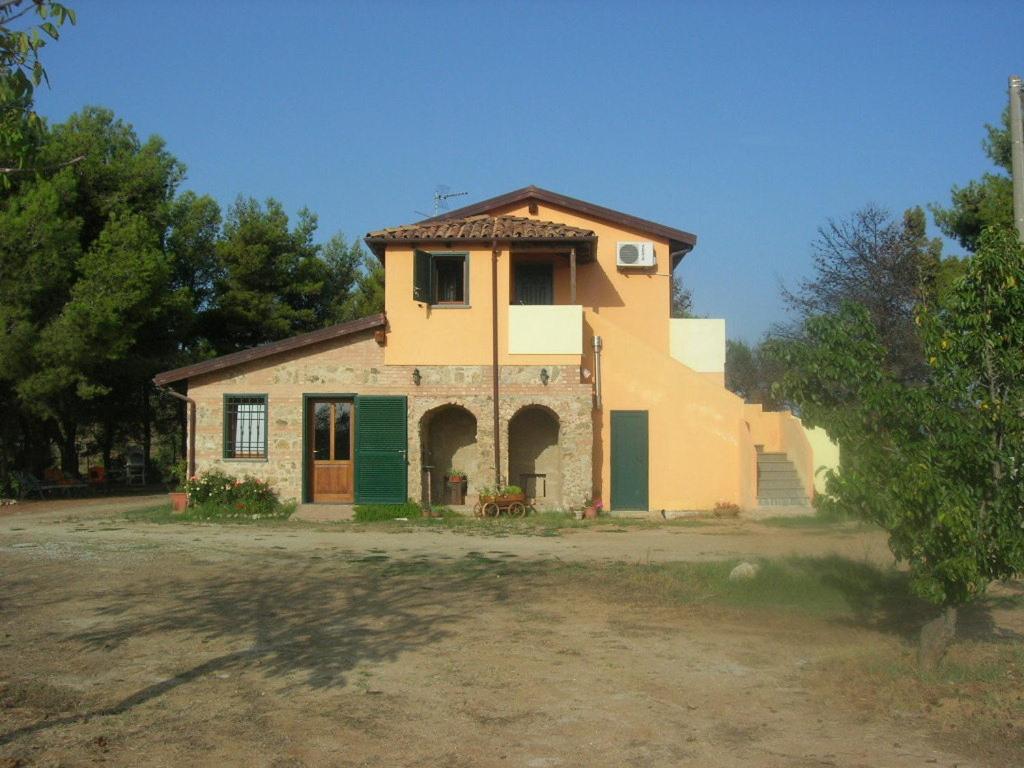 a large house with a large window on top of it at Agriturismo Nakelia in Zambrone